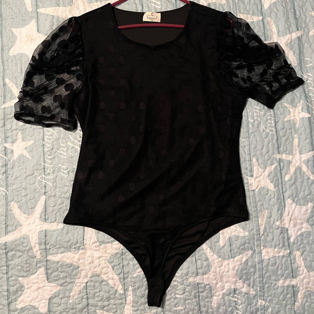 Assorted color. Button snap bodysuits.